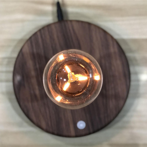 Kreative schwebende LED-Tischlampe aus Walnussholz