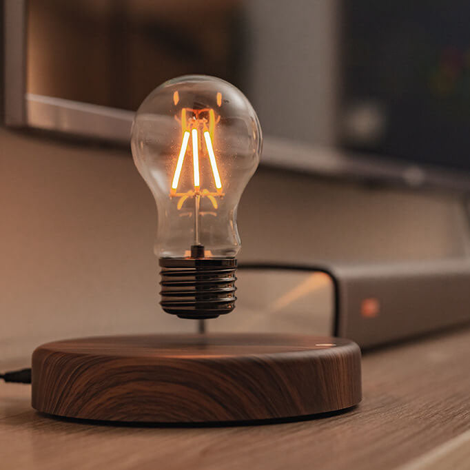 Kreative schwebende LED-Tischlampe aus Walnussholz