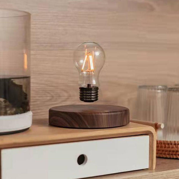 Kreative schwebende LED-Tischlampe aus Walnussholz
